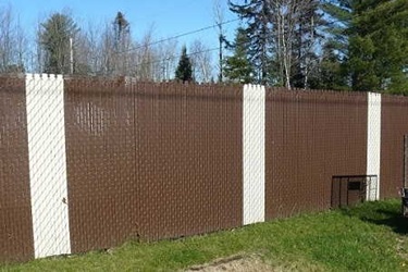 Lattes d’intimité pour clôture installées à Joliette